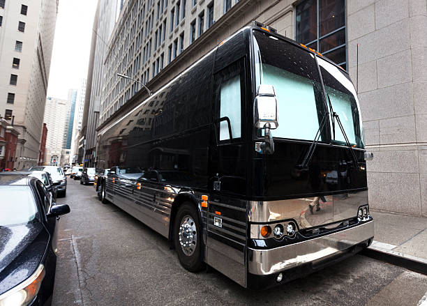 Luxury black party bus parked in Los Angeles for group transportation and special events